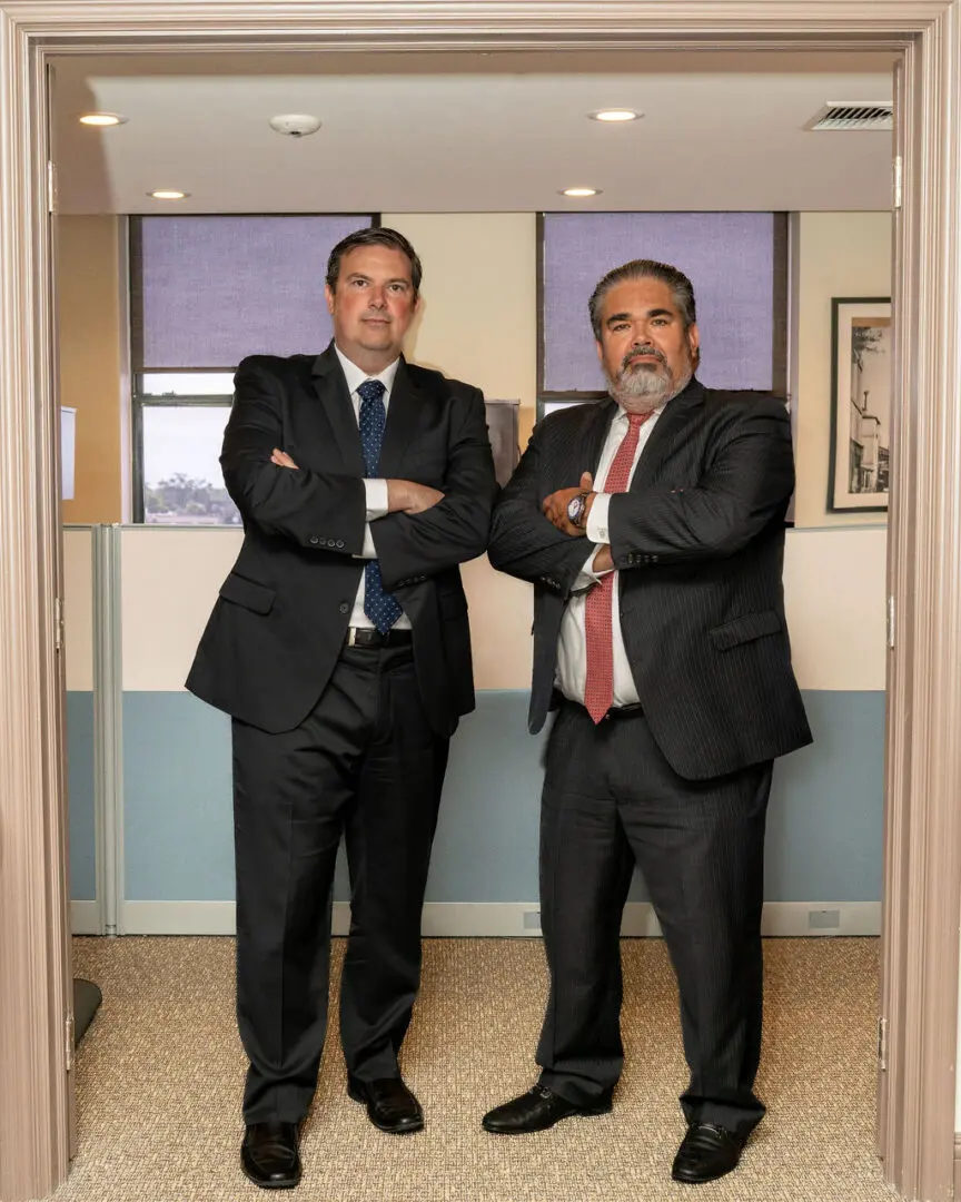 Matthew Voelpel Attorney and Cesar Valdebenito Attorney standing